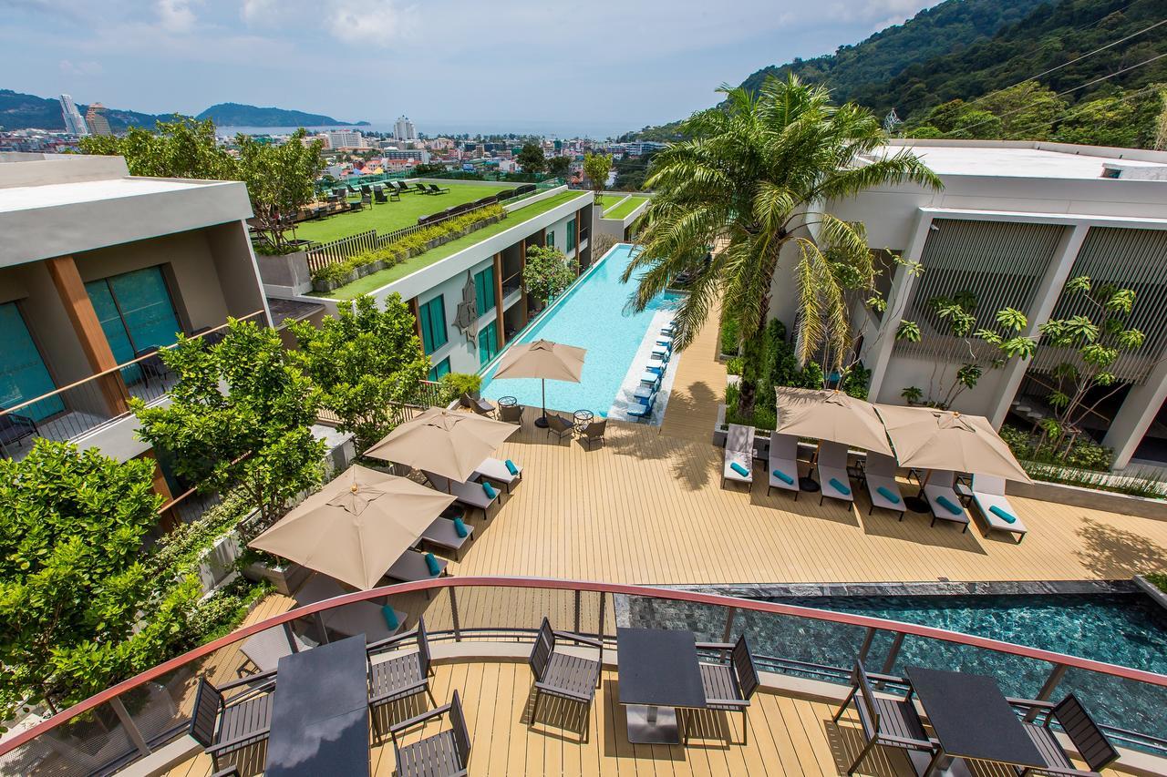 Fusion Suites Phuket Patong Zewnętrze zdjęcie The swimming pool at the hotel