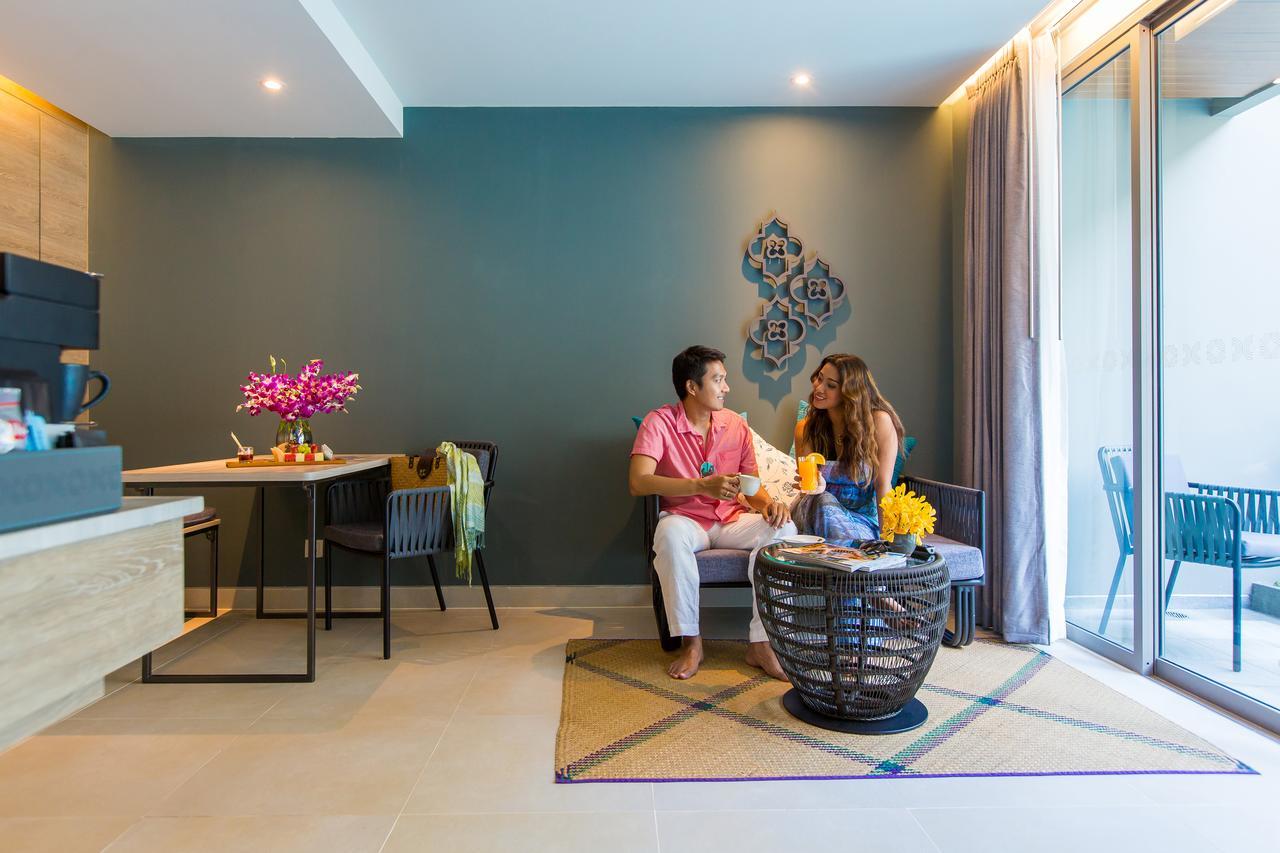 Fusion Suites Phuket Patong Zewnętrze zdjęcie A living room at the hotel